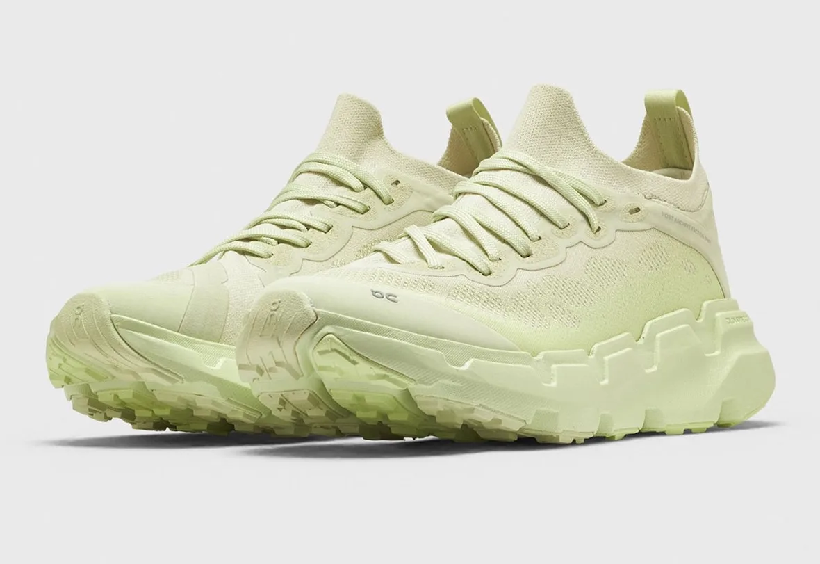 pair, toe-first three-quarter view in pale green with on logo at toe, POST ARCHIVE FACTION
