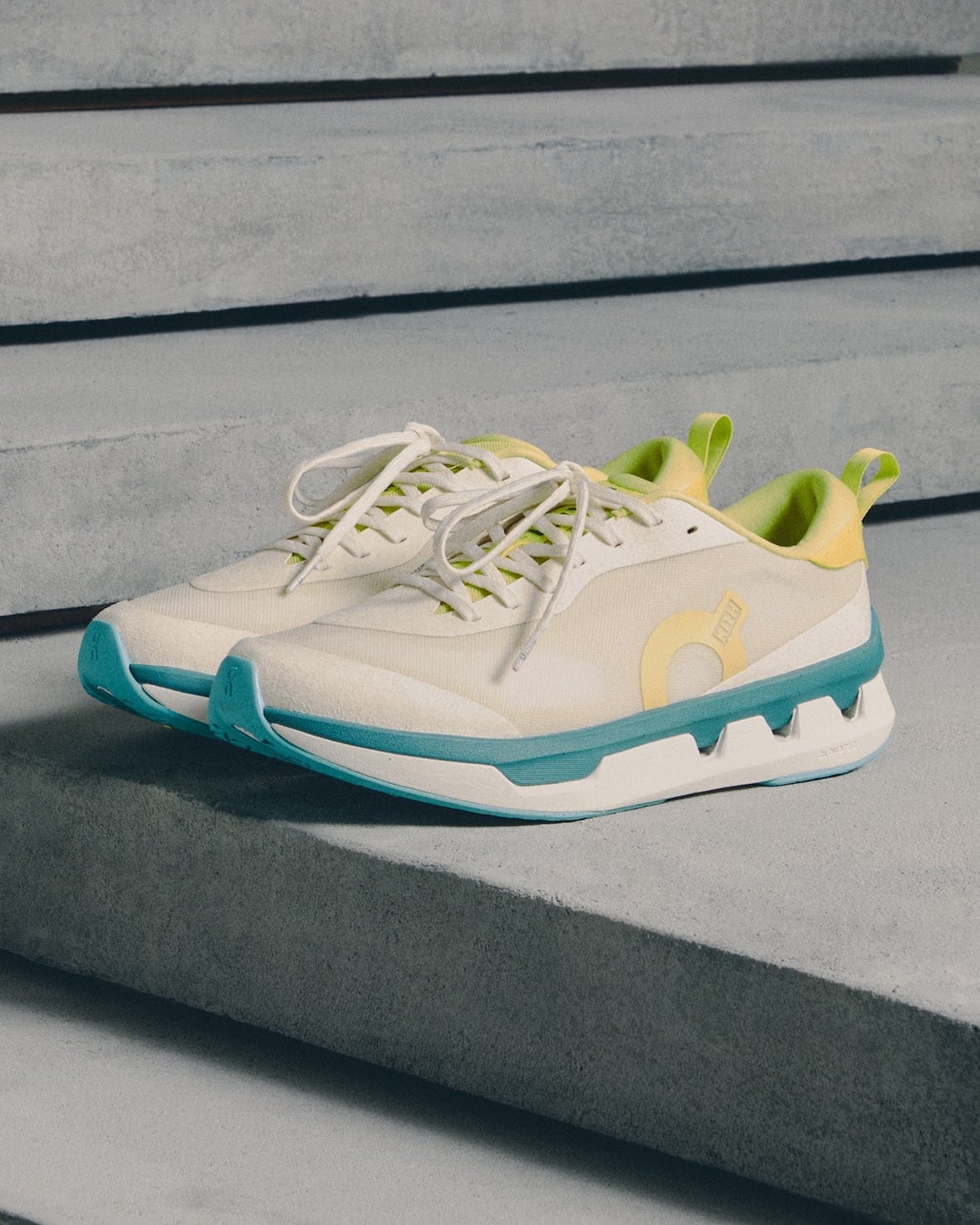 lateral pair, cream upper with teal midsole and yellow-green interior, K Tech 3