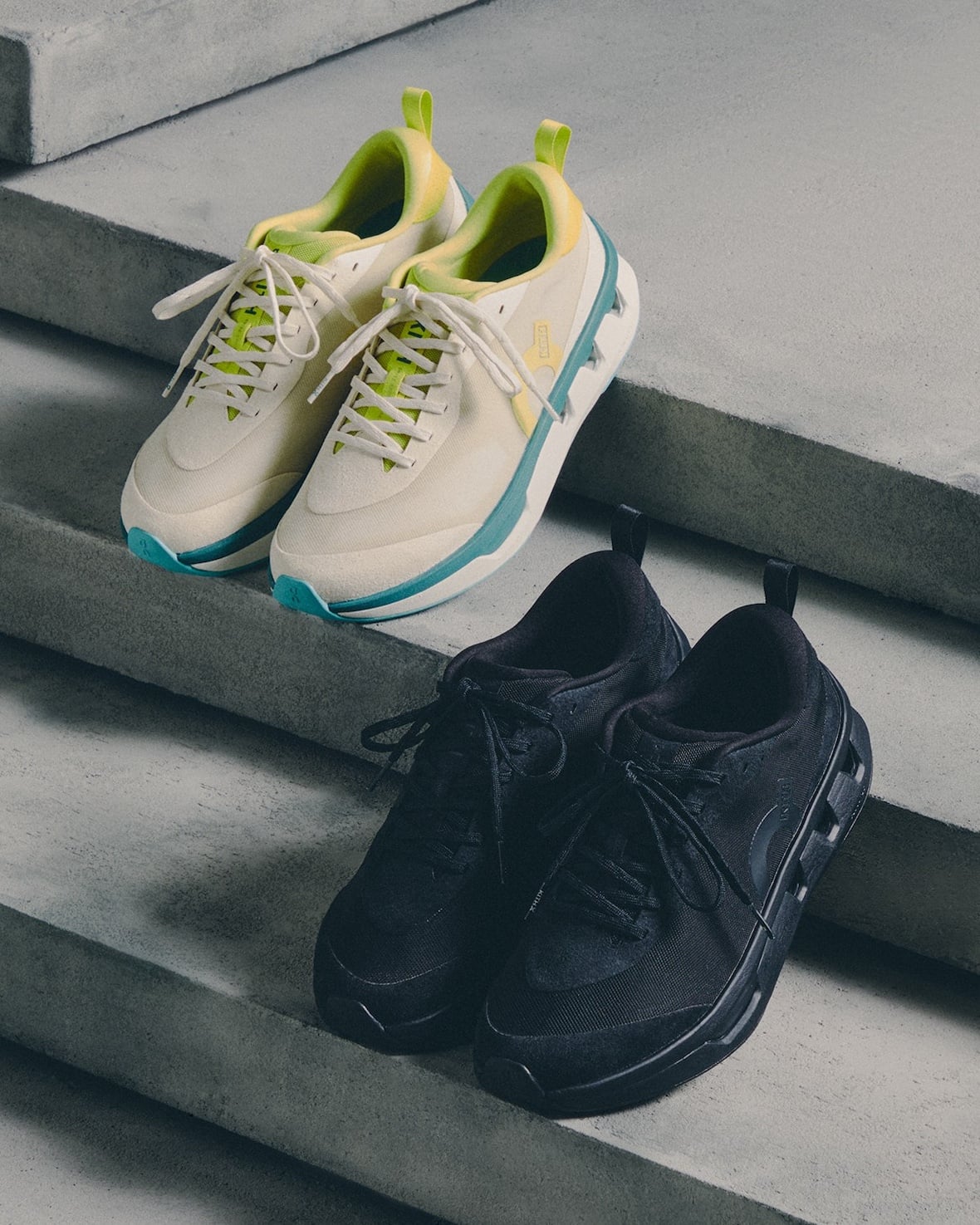 pair group, cream-teal-yellow pair beside all-black pair on steps, K Tech 3