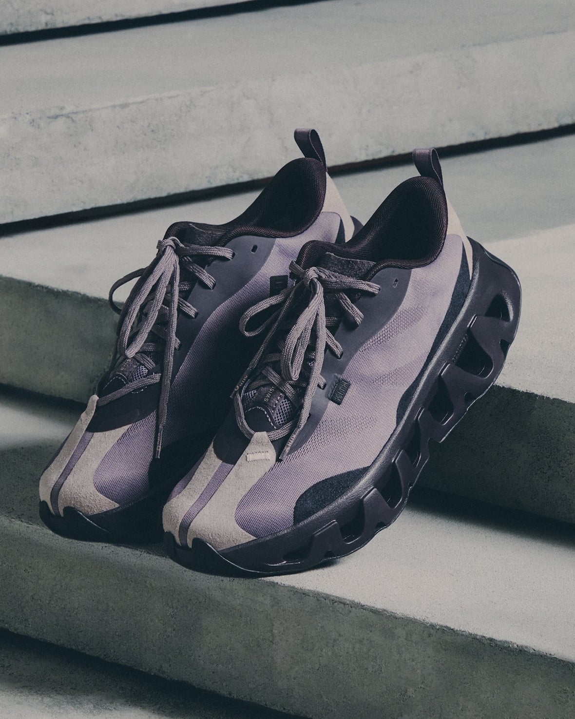 toe view pair, purple mesh with cream suede panels and black cutout sole, K Tech 3