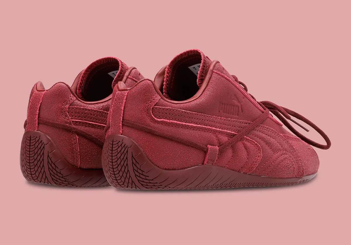 heel view of burgundy crackled pair showing puma branding and tread sole, OG x Rosé