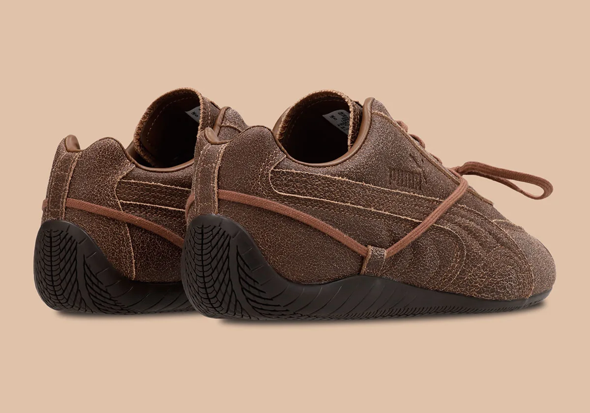 heel view of brown crackled pair showing puma branding and tread sole, OG x Rosé