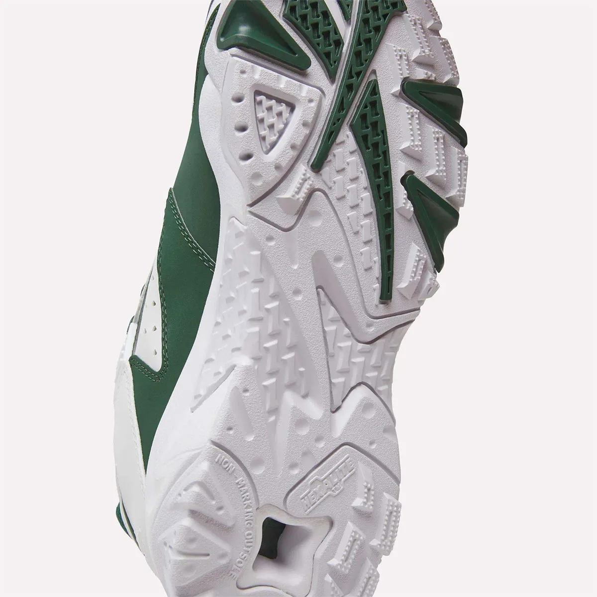 close-up angled outsole and heel detail, green and white traction lugs, Reebok Brutus Lo