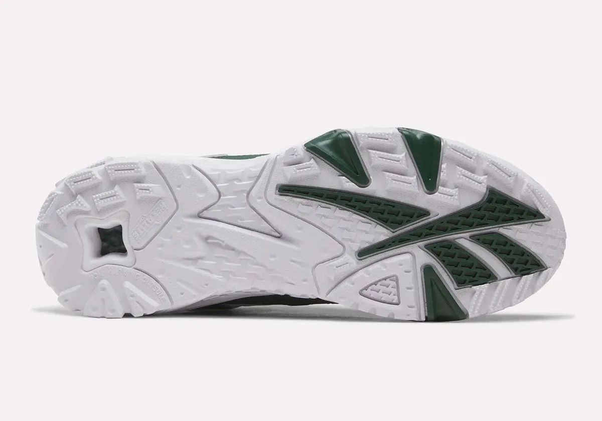 outsole view, white tread with dark green triangular traction pods, Reebok Brutus Lo