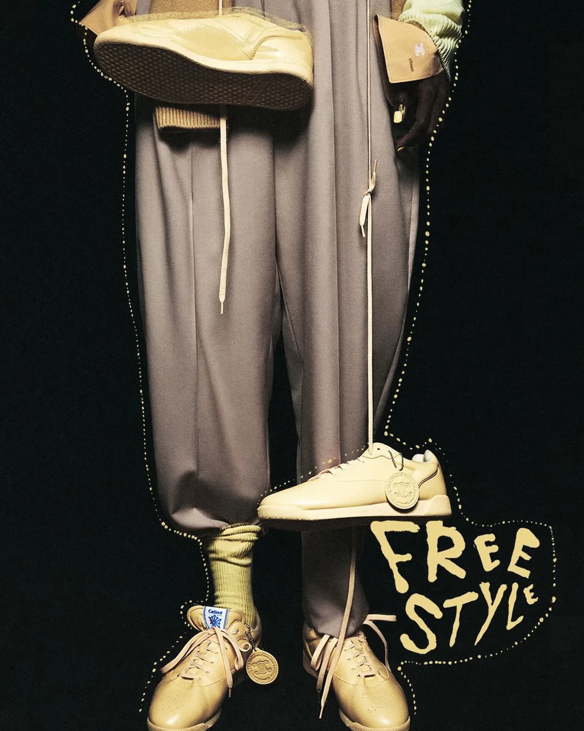 Pair dangling, pale yellow sneakers with dotted outline graphic, Lo x Celine