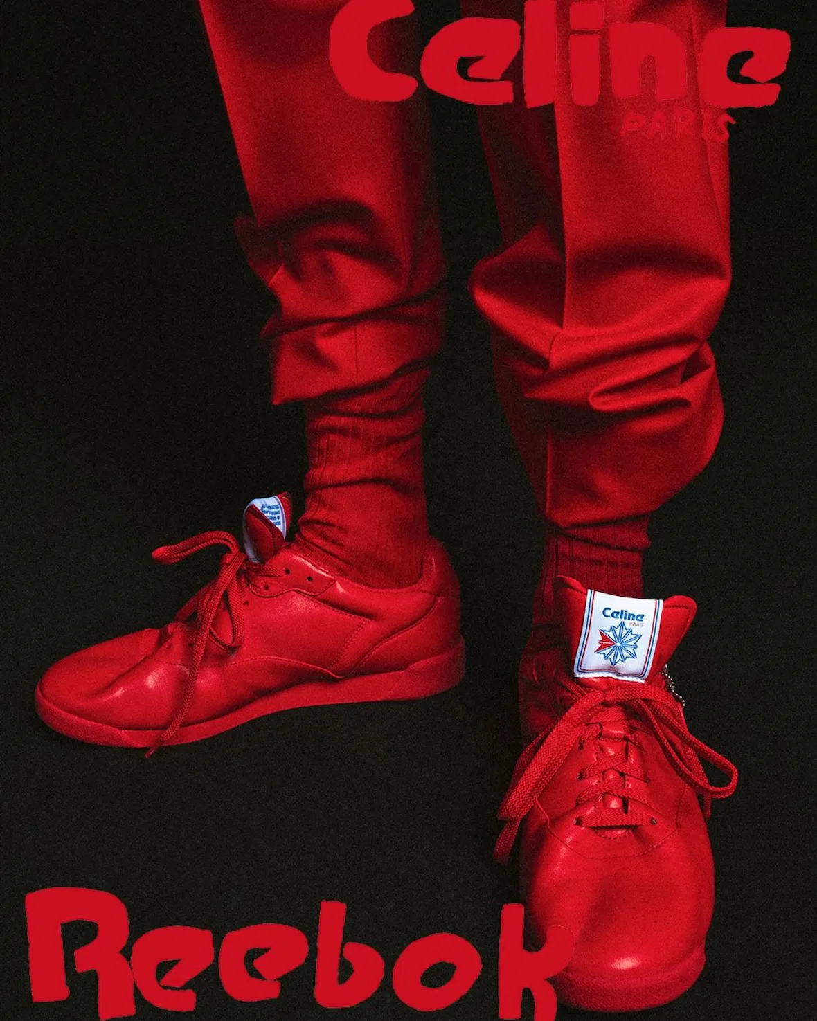 On-foot pair, red-toned sneakers with Celine and Reebok wordmarks, Lo x Celine