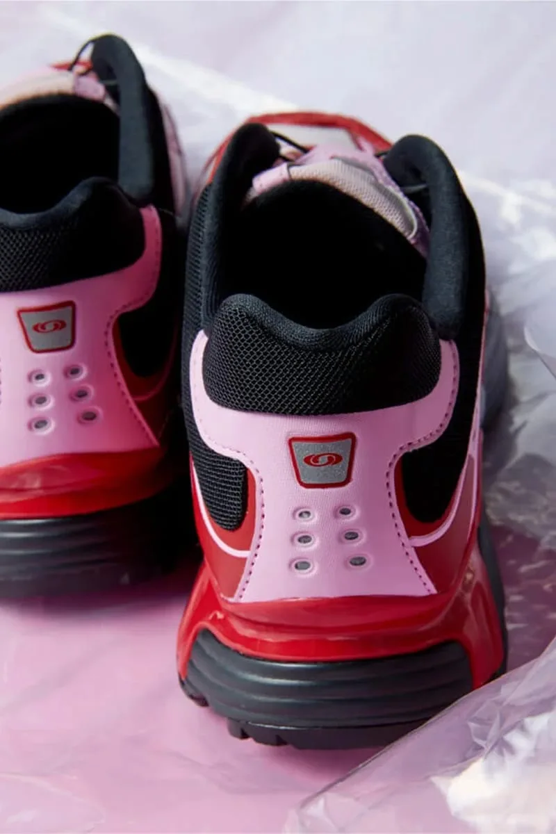 heel close-up pair showing pink counters and red Salomon logo pull-tabs, Cherry Cake Party