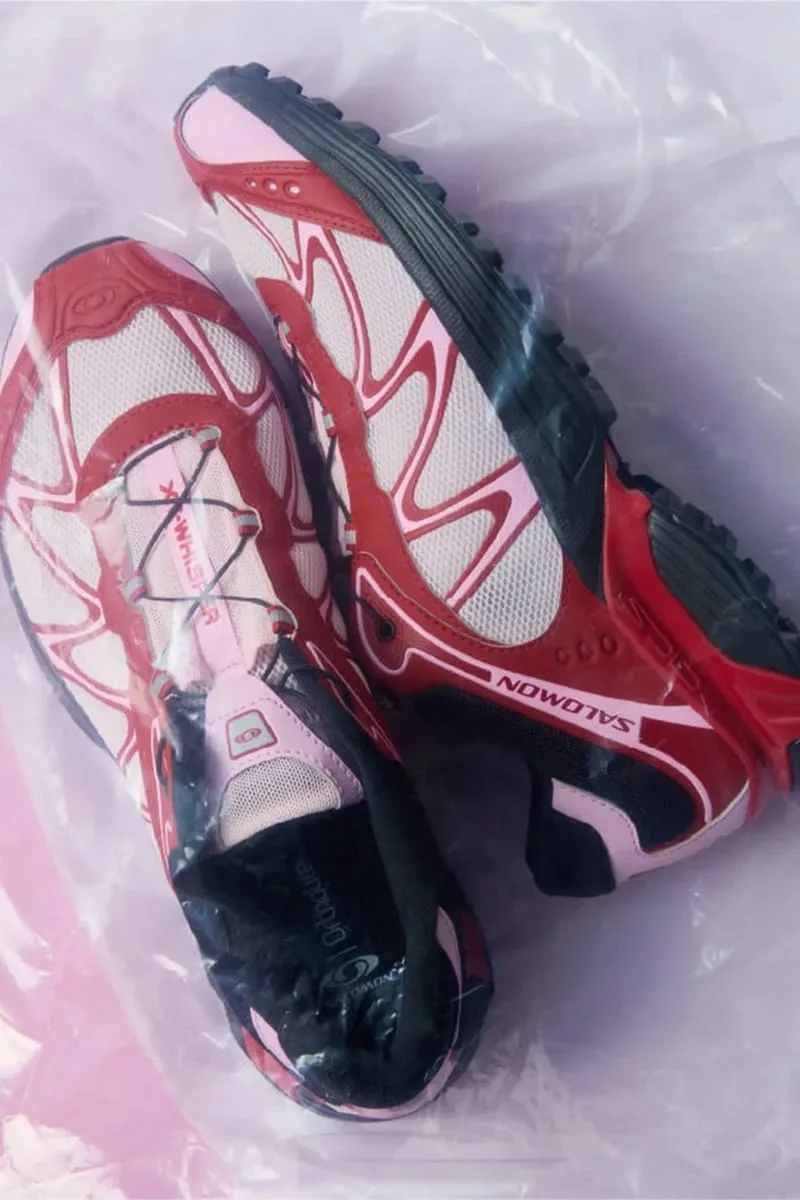 top-down mirrored pair on pink plastic packaging showing red Salomon logo, Cherry Cake Party