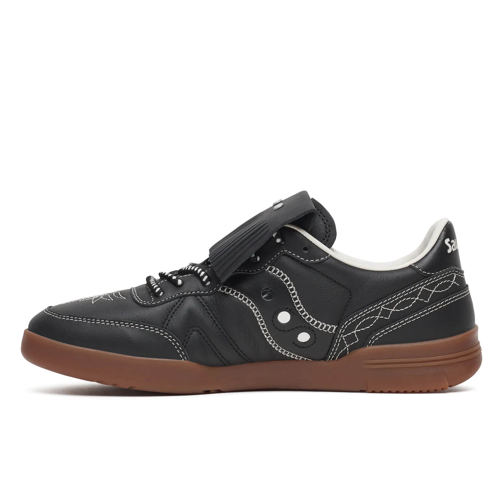 side view, black leather court shoe with white stitching and saucony heel tab, Space Cowboy