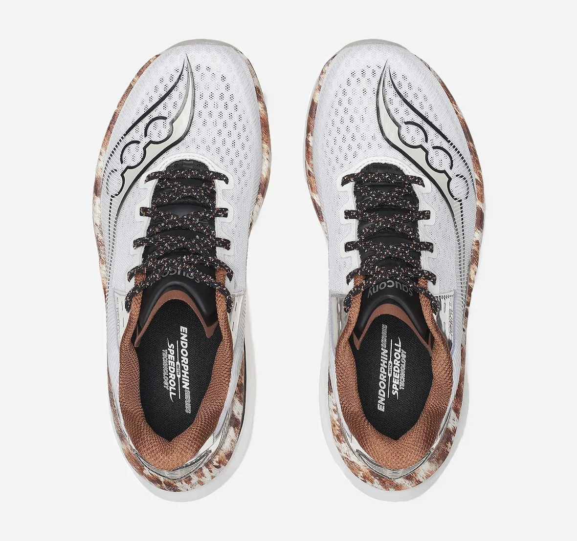 top-down pair, white mesh uppers with black laces and cowhide-print midsole edges, Space Cowboy