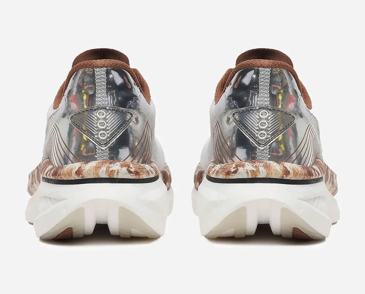 heel view pair, white mesh uppers with brown collars and cowhide-print midsoles, Space Cowboy