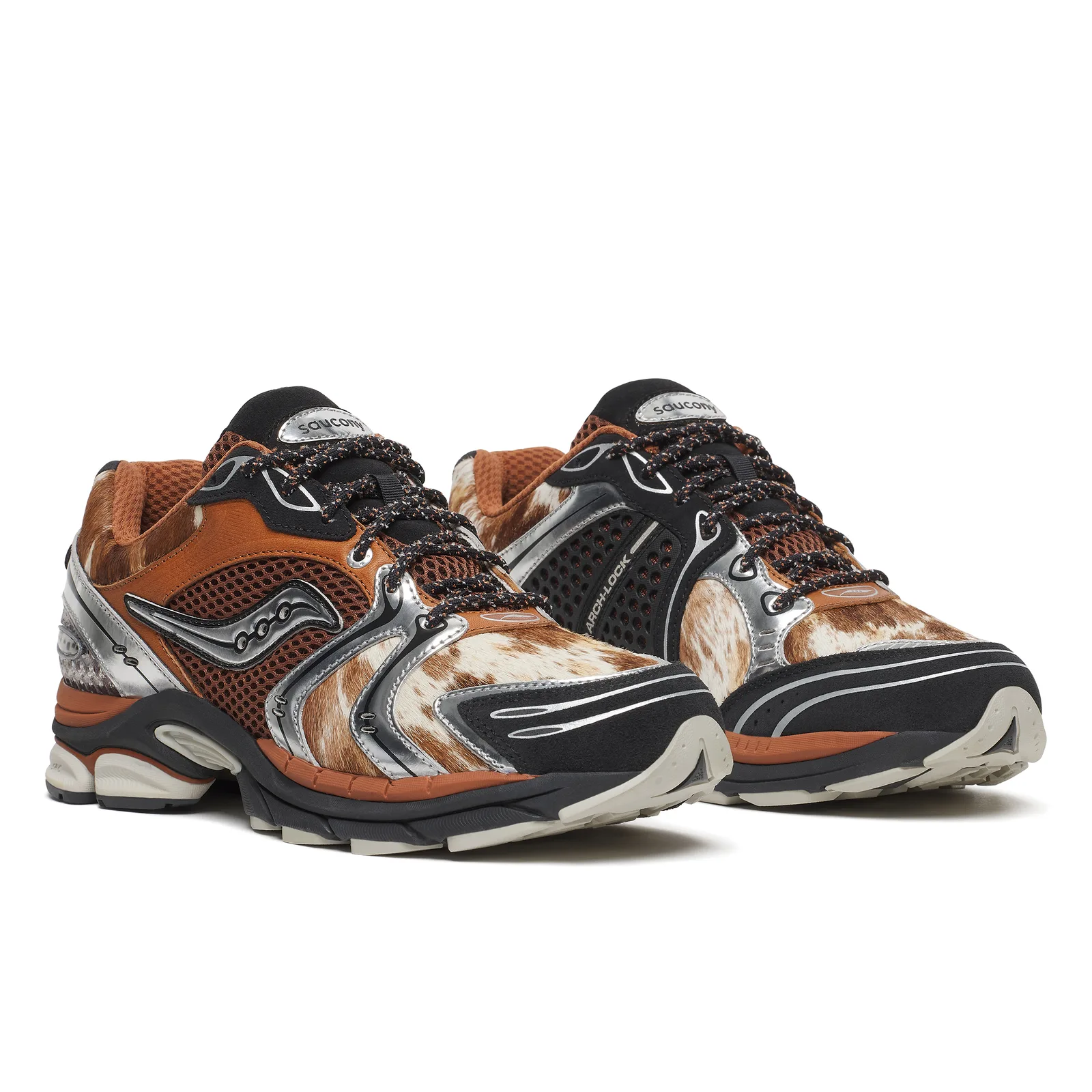front-angled pair, orange leather and cowhide fur panels with silver overlays, Space Cowboy