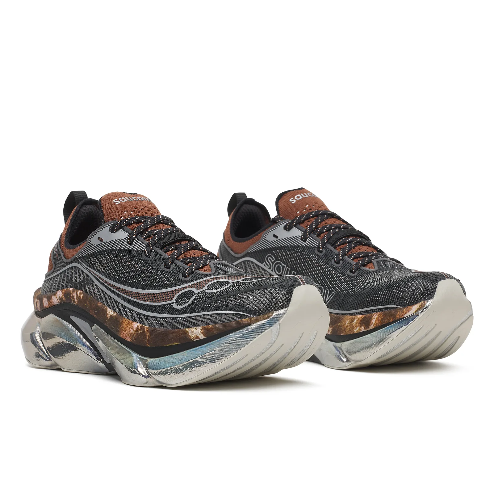 front-angled pair, black mesh uppers with brown collars and cowhide midsoles, Space Cowboy