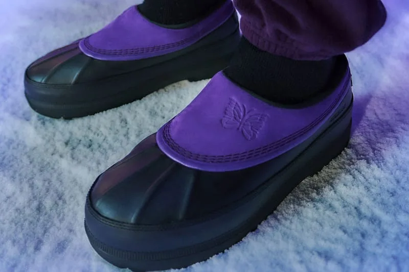 Toe detail on-foot, purple suede toe with embossed butterfly logo, black sole, NEEDLES Ambler Collection