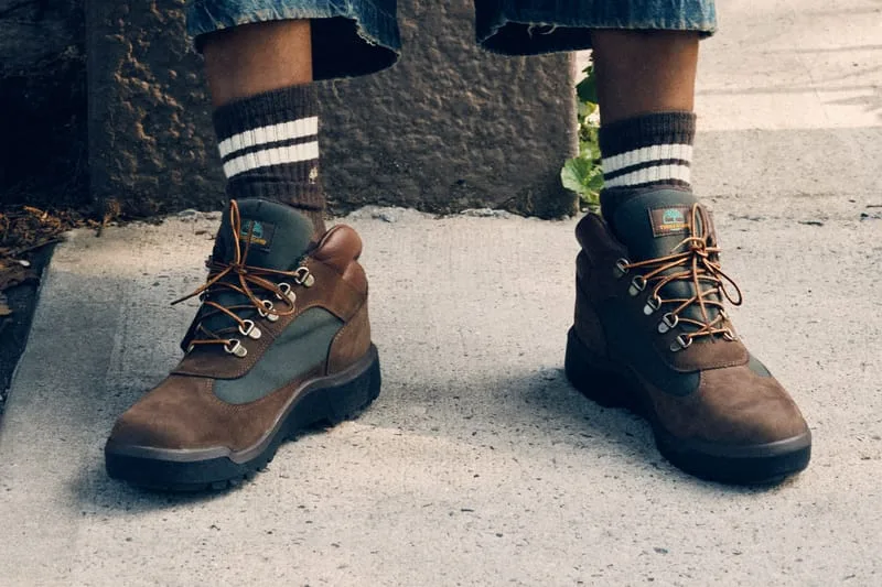 on-foot pair, brown nubuck with olive suede panels, striped socks on sidewalk, Timberland Field Boot in Brown and Olive Green