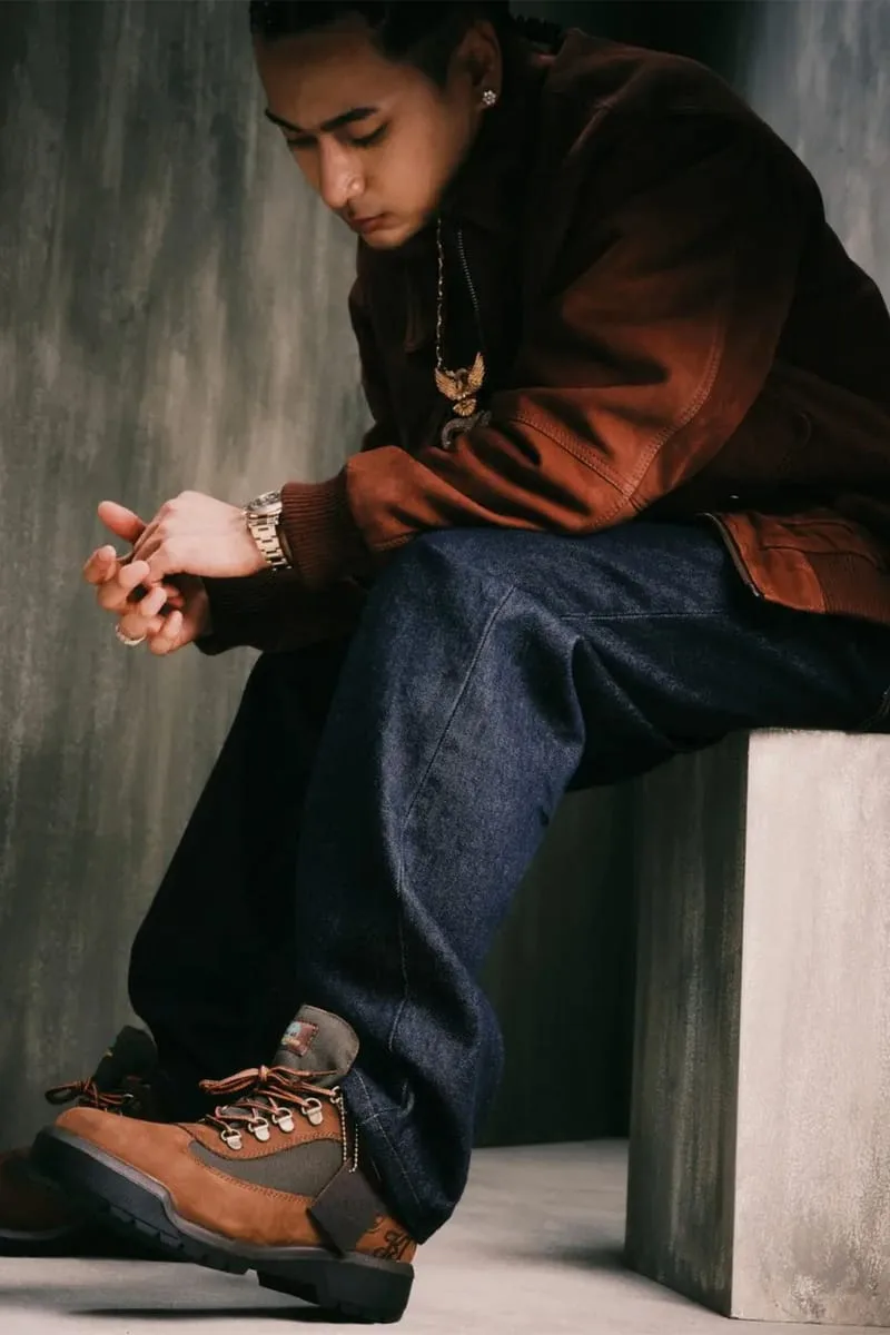 on-foot seated shot, boot with dark jeans and brown leather jacket, Waterproof Field Boot