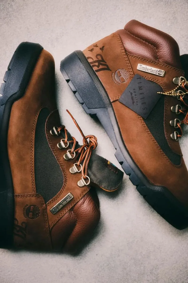 top-down pair view, tan nubuck with dark tree-logo patch and 'KJ' branding, Waterproof Field Boot