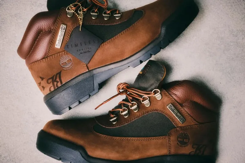 lateral pair view, tan nubuck, black overlay, orange laces, tag on tongue, Waterproof Field Boot