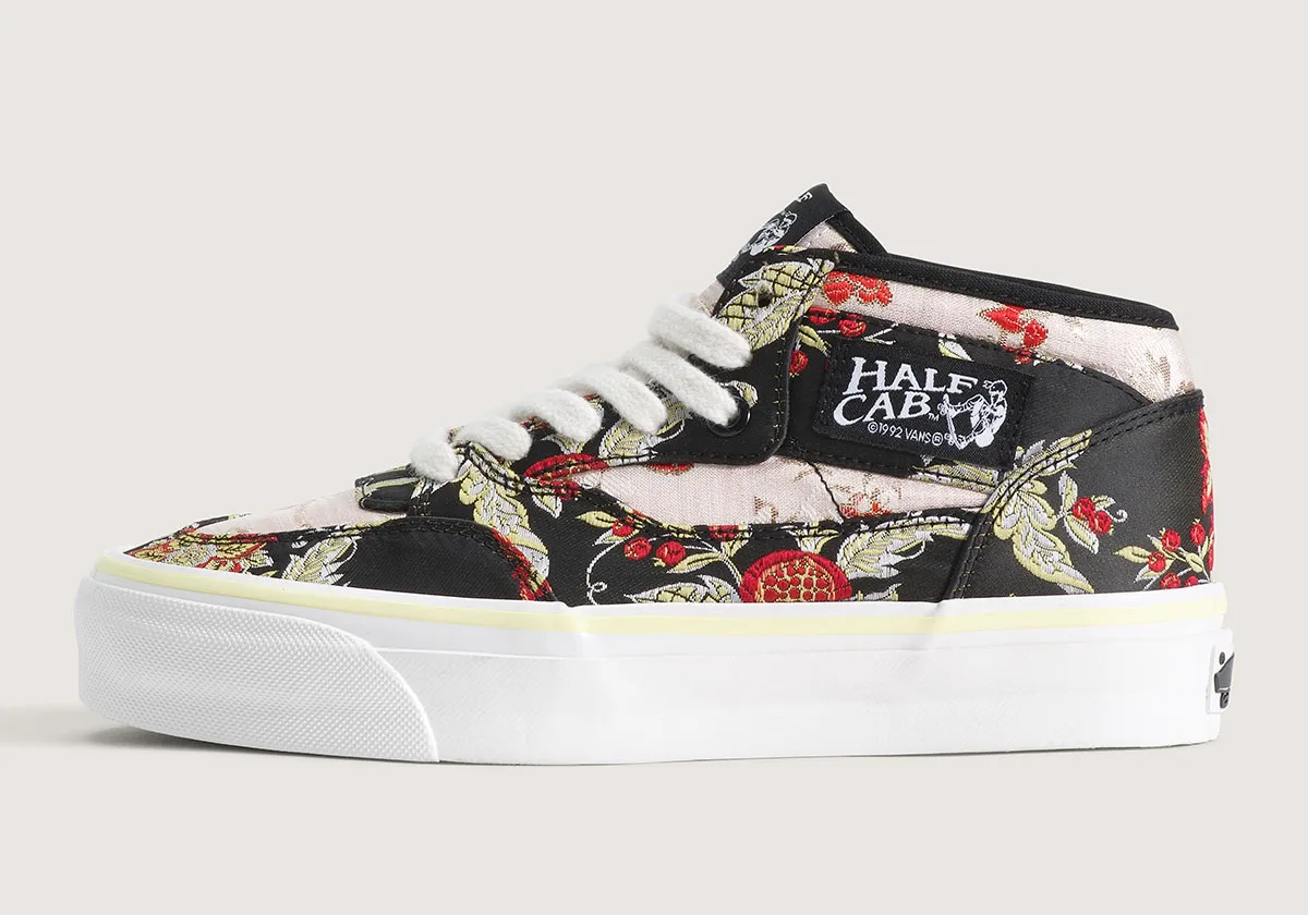lateral view, black floral tapestry upper with pink panel and yellow midsole trim, Vans Half Cab 33 "Floral Tapestry" Pack