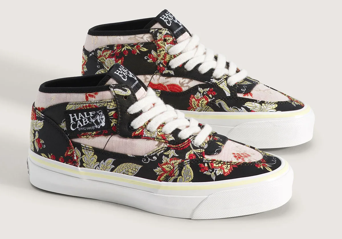 pair shown angled, black floral tapestry uppers with pink accents and yellow trim, Floral Tapestry
