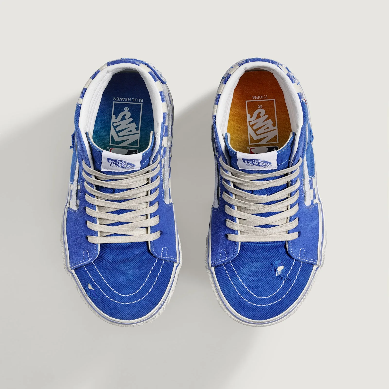 top-down pair, gradient insoles reading Blue Heaven and 7:10pm, Los Angeles Dodgers