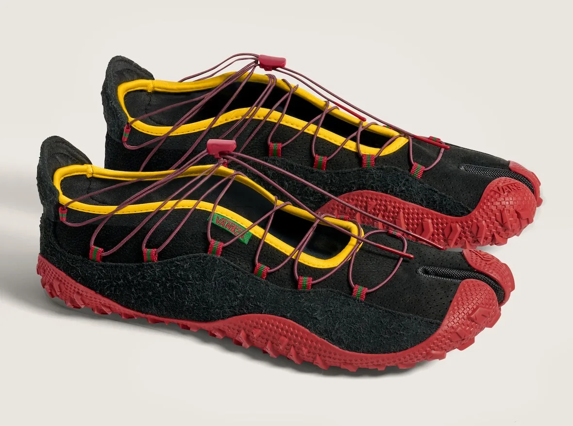 pair, lateral view, black trail shoes with red toe caps and bungee laces, SZA VANSZA Collection