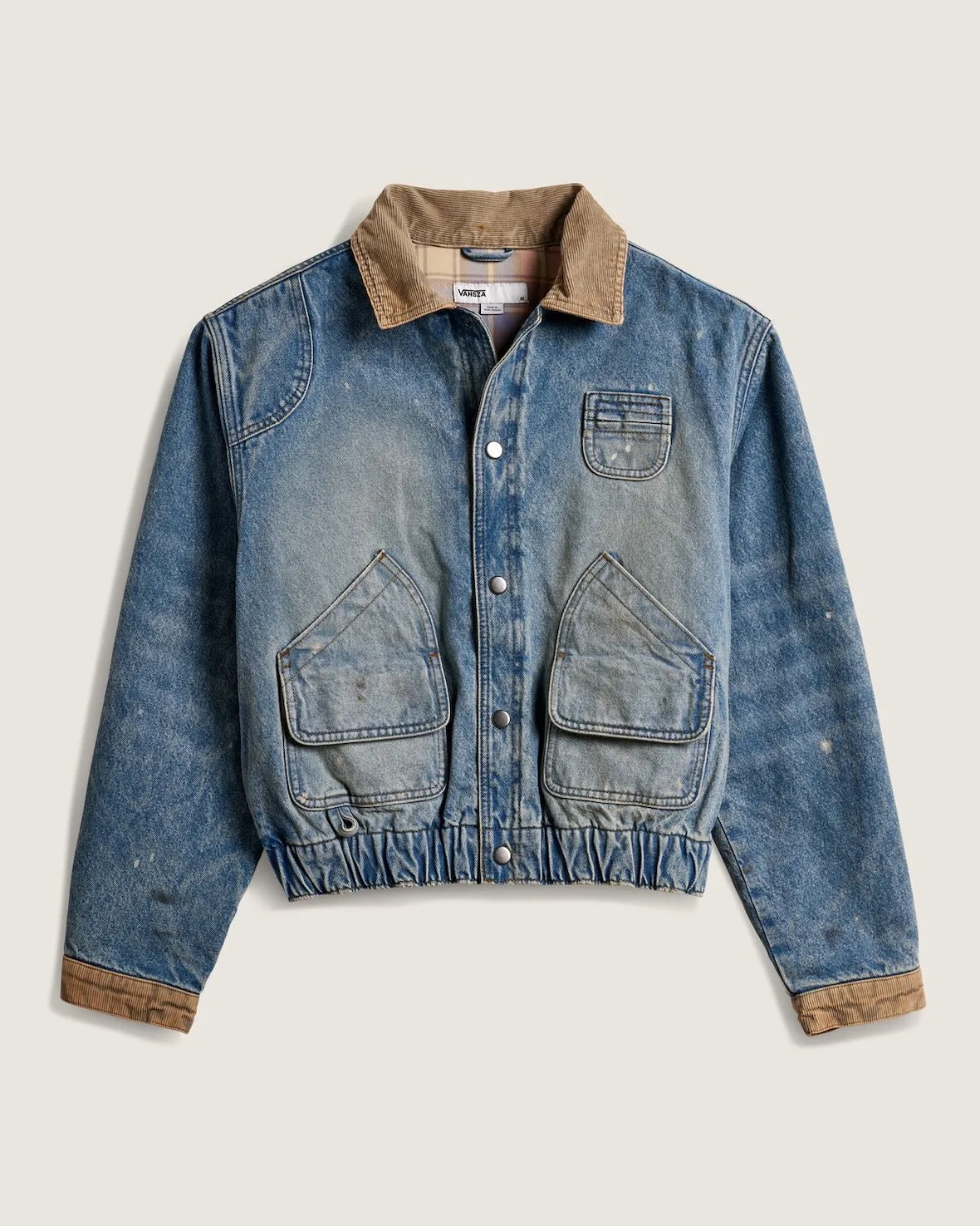 flat lay of cropped denim jacket with tan corduroy collar and cuffs, SZA VANSZA Collection