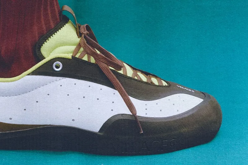 on-foot toe close-up, white shoe with brown laces and lime green tongue, VILLAGE PM 2PM