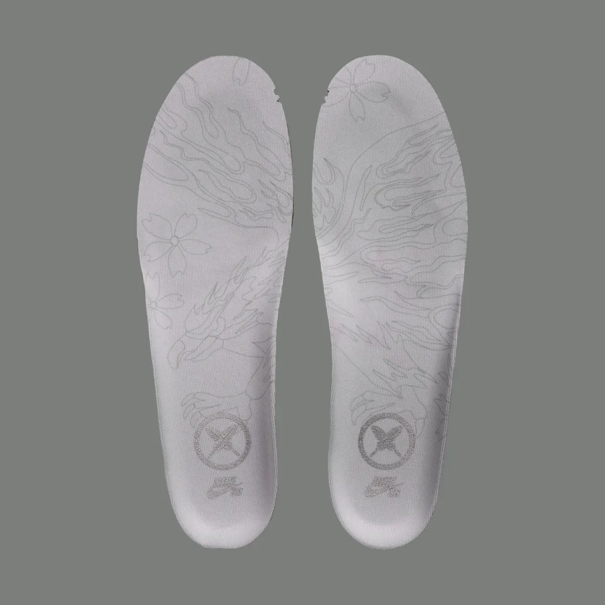 top-down pair of insoles, faint flame and cherry blossom print with X logo, Iron Grey