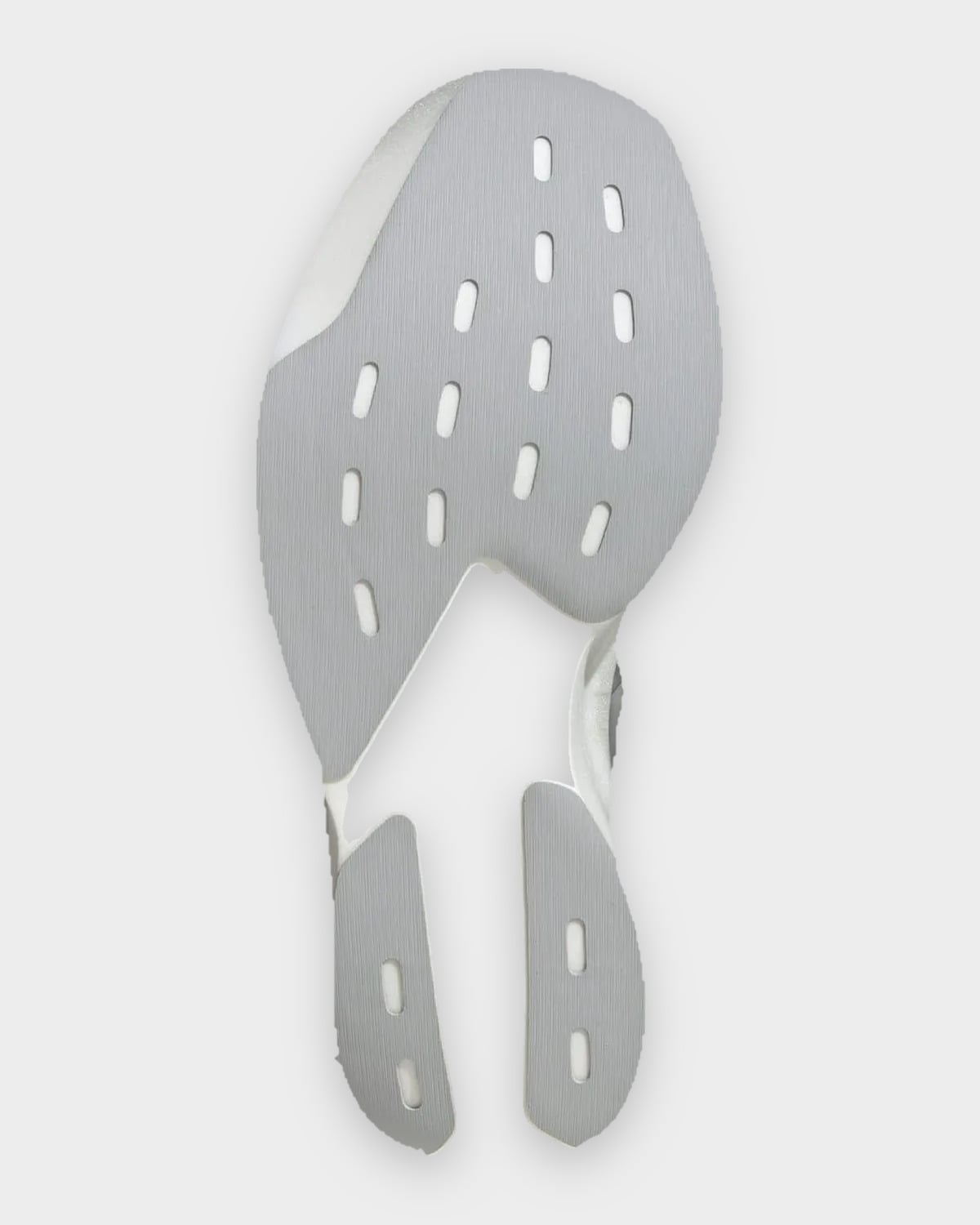 Outsole view in grey with oval cutouts, split into forefoot and two heel pads, 2 x Satisfy