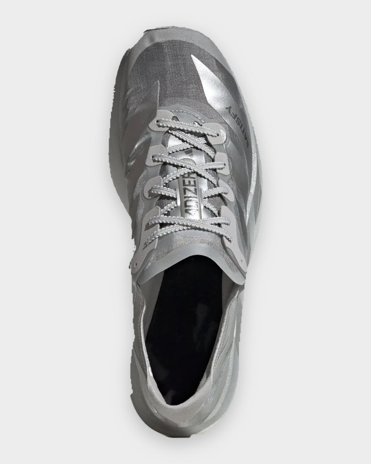Top-down view of silver shoe with grey laces, black insole and ADIZERO tongue text, 2 x Satisfy