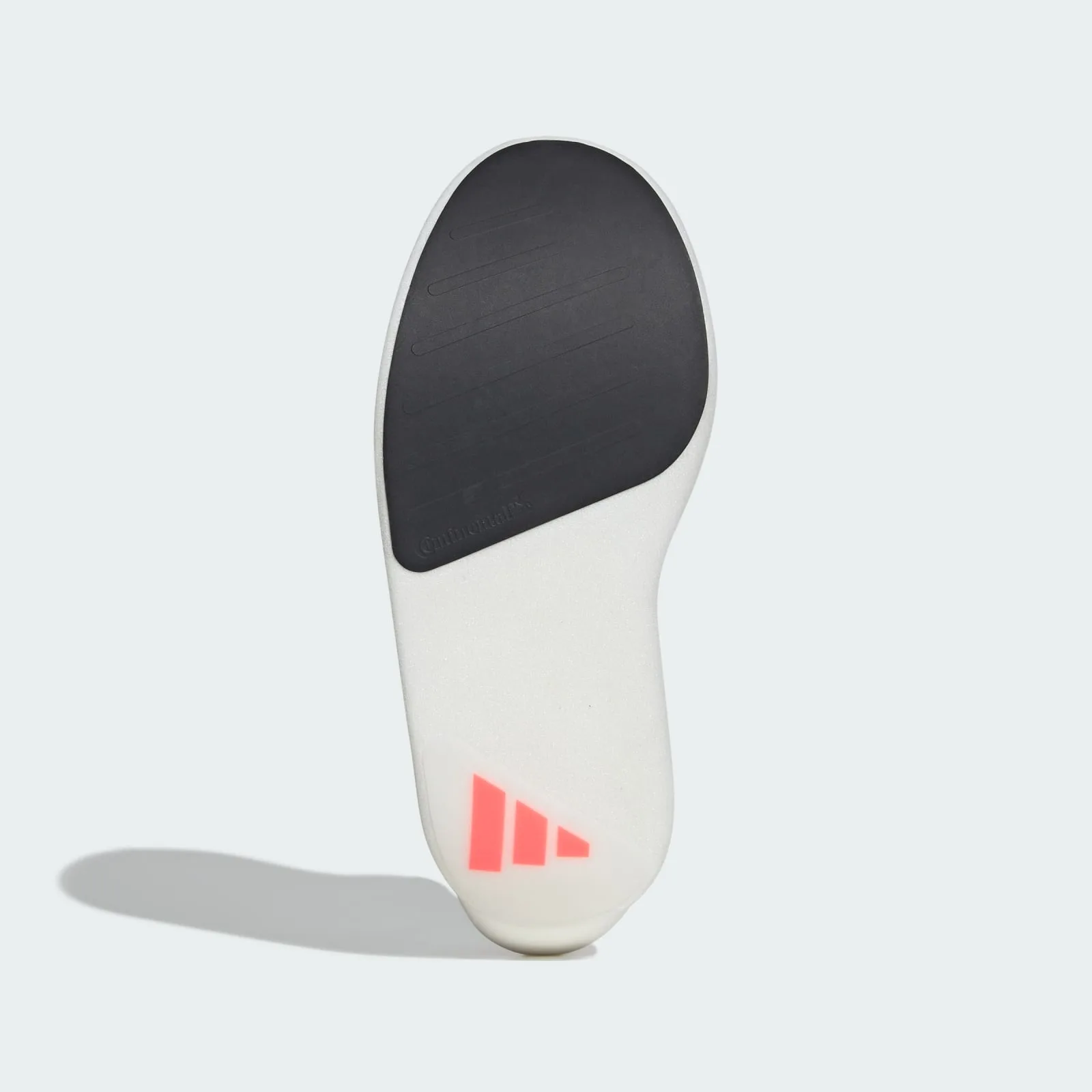 Outsole view with dark grey rubber forefoot patch, white foam heel and orange-red three-stripe logo, Pro EVO 3