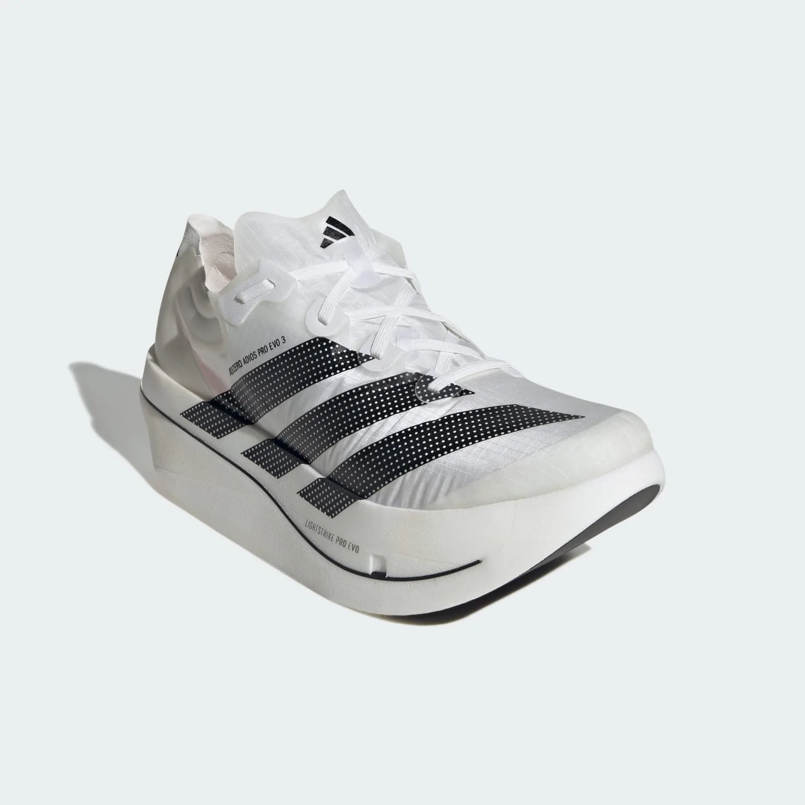 Front three-quarter view, white translucent upper, black dotted stripes, thick white midsole with black line, Pro EVO 3