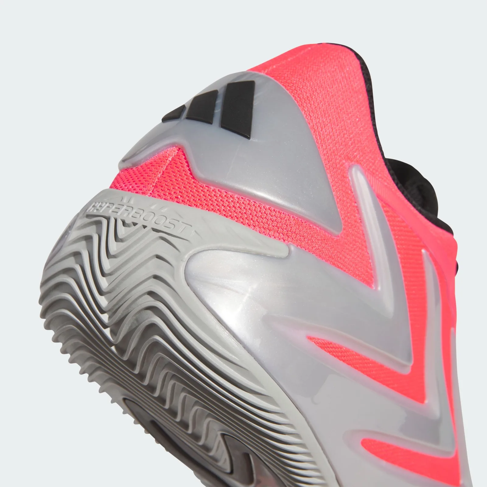 Heel detail, black adidas three stripes on silver cage, Hyperboost on grey sole, Omen