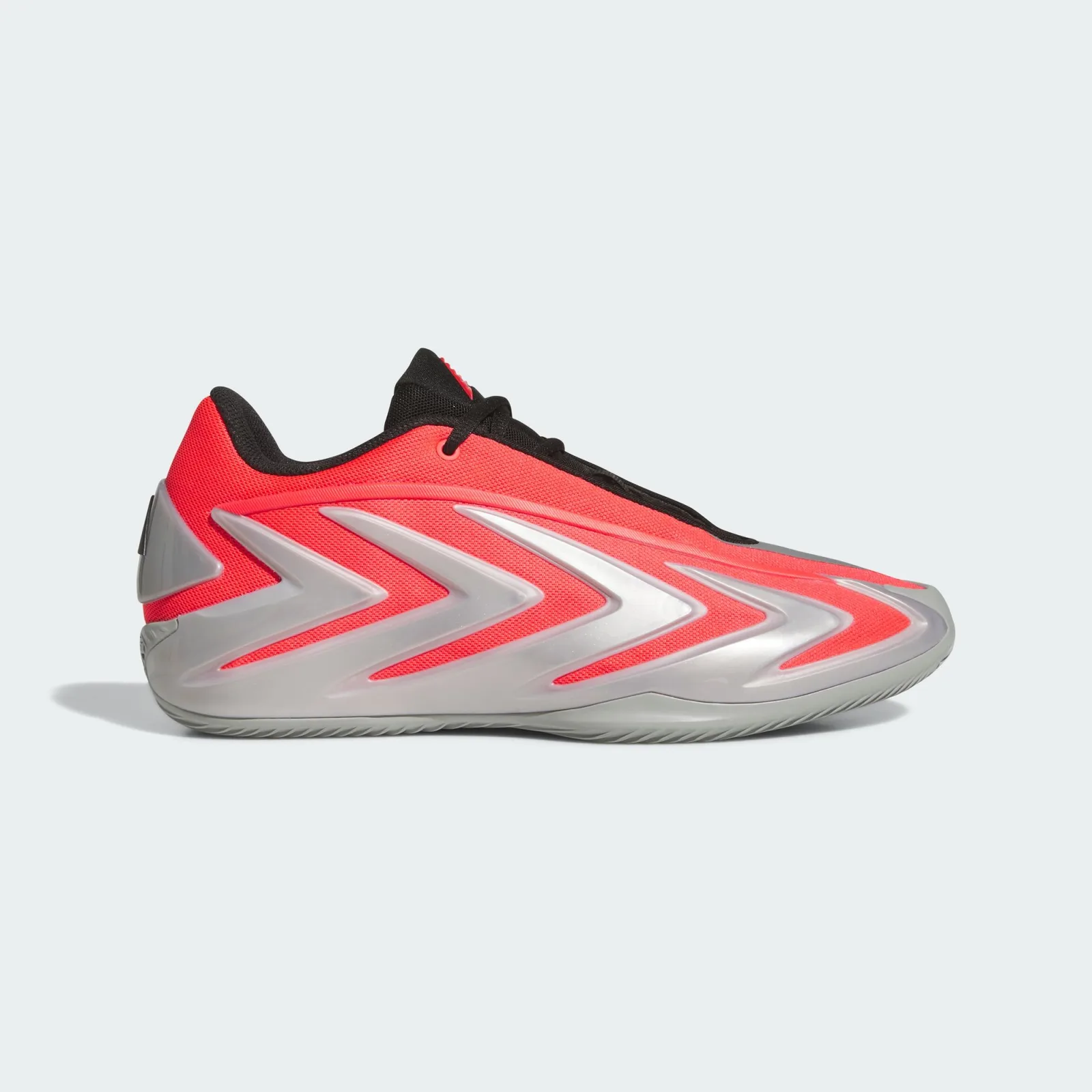 Lateral view, red mesh upper with silver chevron overlays and grey outsole, Omen