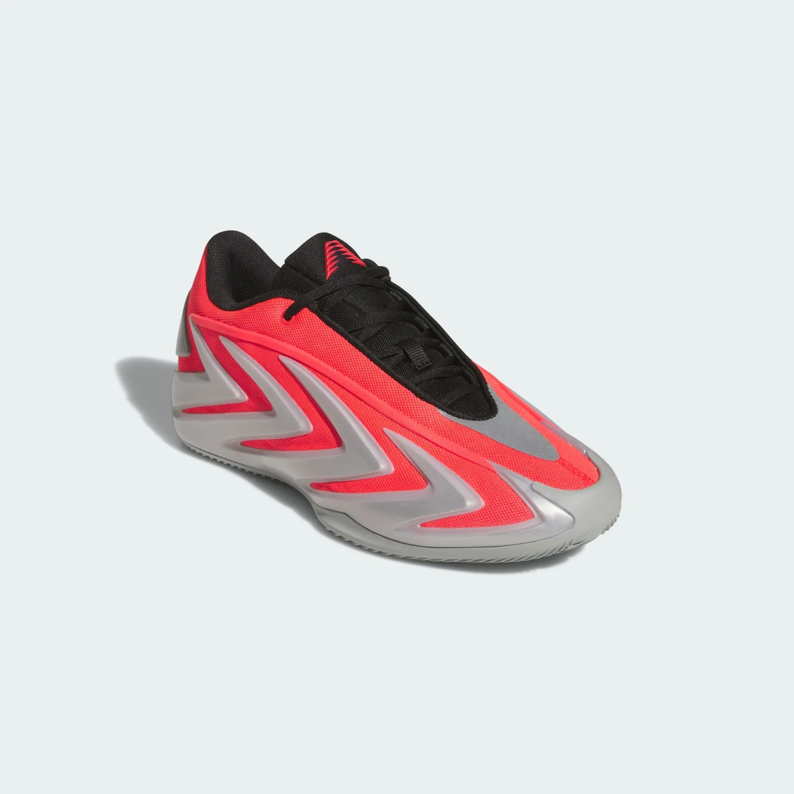Front three-quarter view, red upper, black lacing, silver toe panel and grey sole, Omen