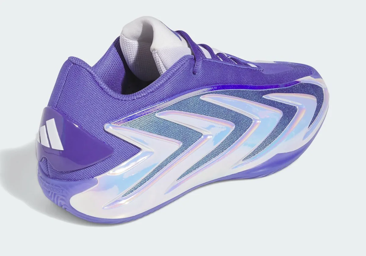 Heel three-quarter view showing white three-stripe logo on purple heel tab and iridescent side panels, Purple Iridescent