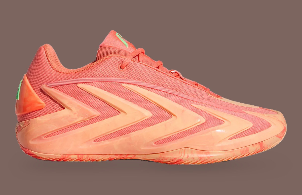 Lateral view, coral mesh upper with peach chevron overlays and marbled sole, With Love