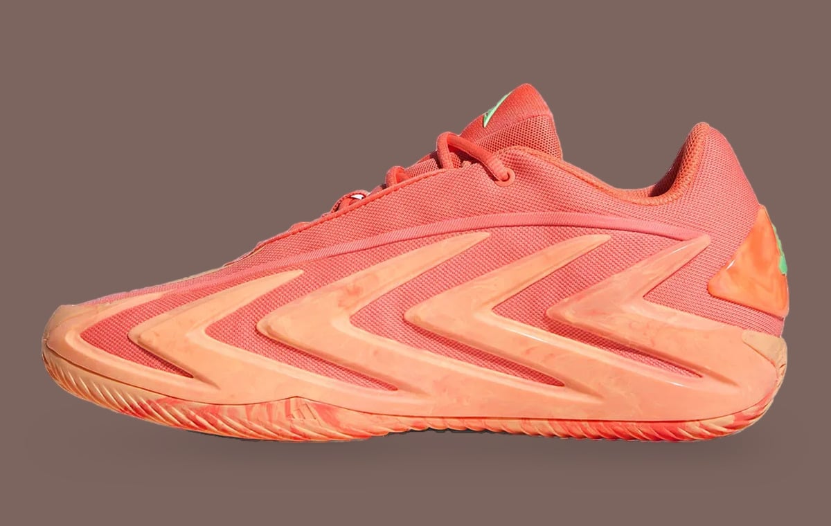 Medial view, coral mesh upper, peach chevron overlays, marbled sole, green heel accent, With Love