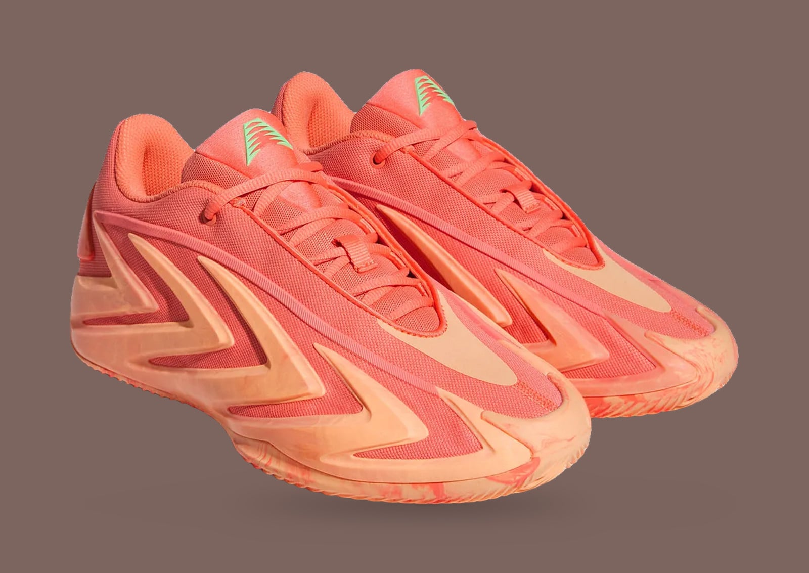 Pair, three-quarter view, coral mesh uppers, peach zigzag overlays, green logo, adidas Anthony Edwards 3 “With Love”