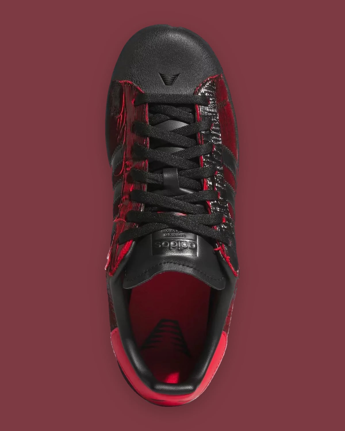 Top-down view: black laces, red lining and insole with black logo, shell toe with small logo, Halloween
