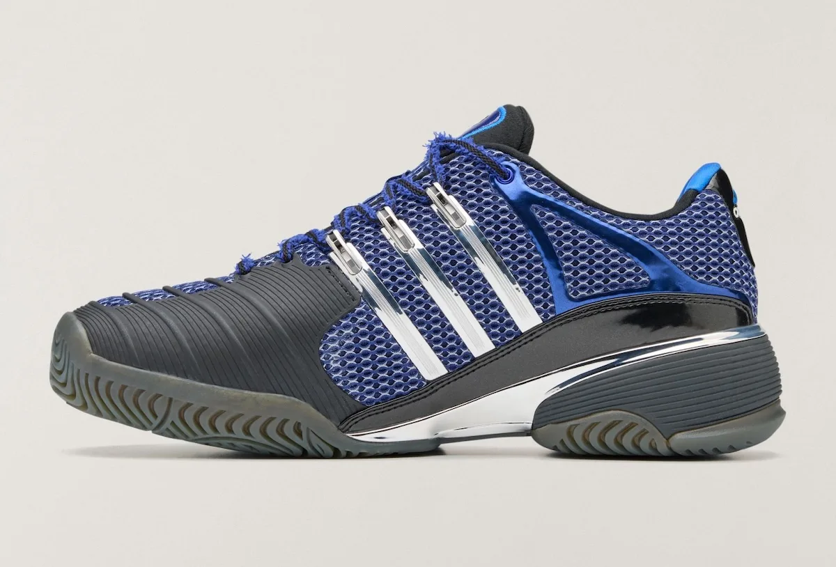 Medial view of blue mesh shoe with chrome stripes, black toe overlay and grey sole, x Brain Dead