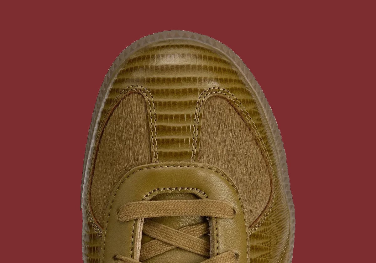 Toe detail from above: lizard-textured toe cap, hairy panels, stitching, olive laces, Khaki Pony