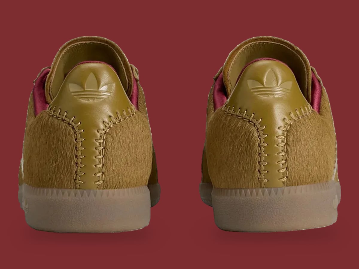 Heel view of pair: olive leather heel tabs with trefoil logo, stitched seams, gum soles, Khaki Pony
