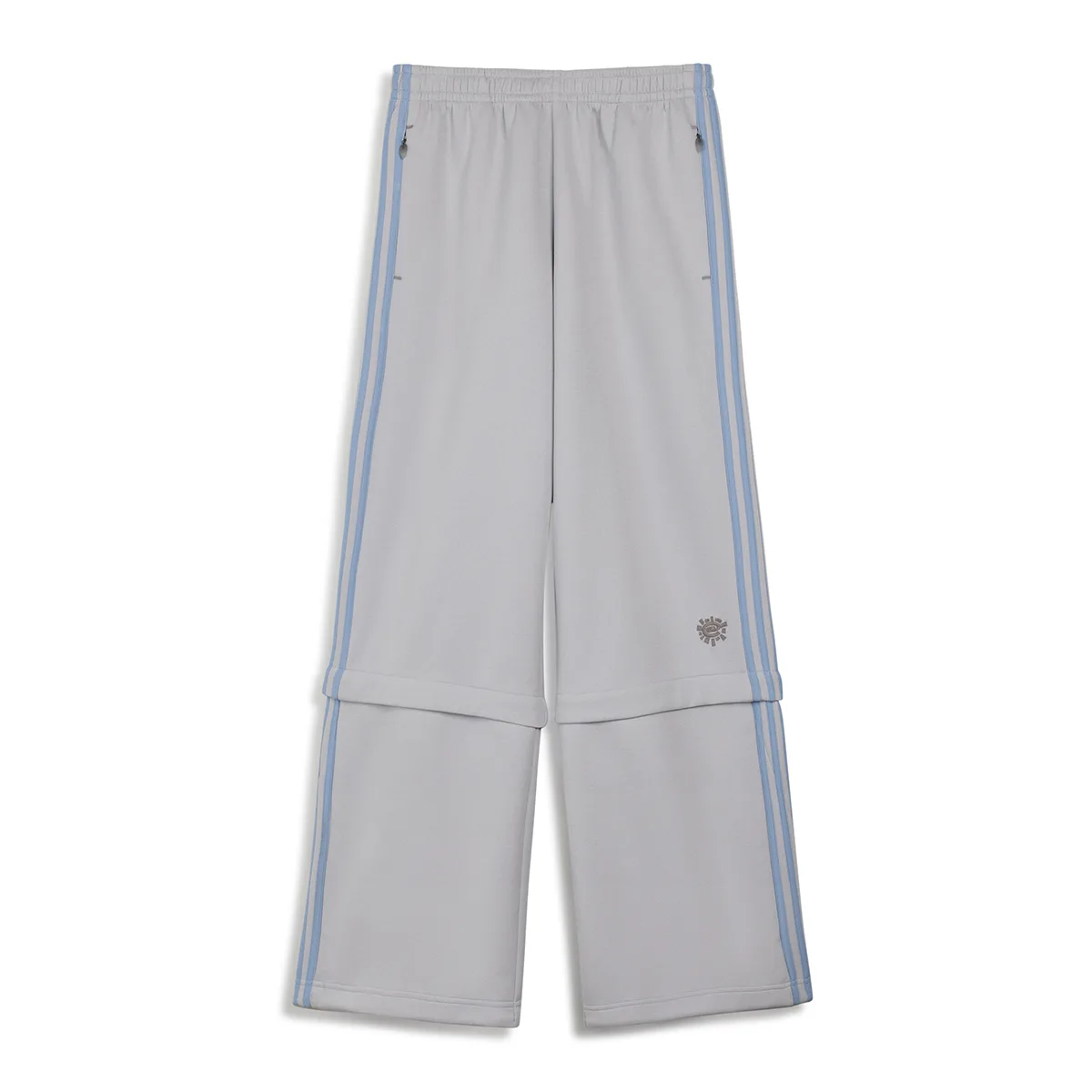Pale grey wide-leg track pants with blue side stripes and a layered knee seam on white, Climacool x ADWYSD