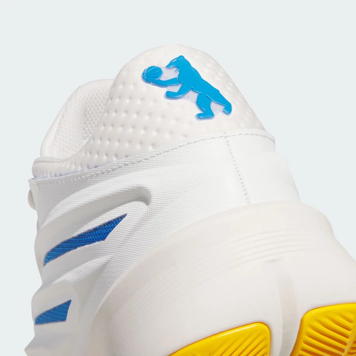 Heel detail with a blue bear holding a basketball on a dotted white heel tab, Wagner Brothers