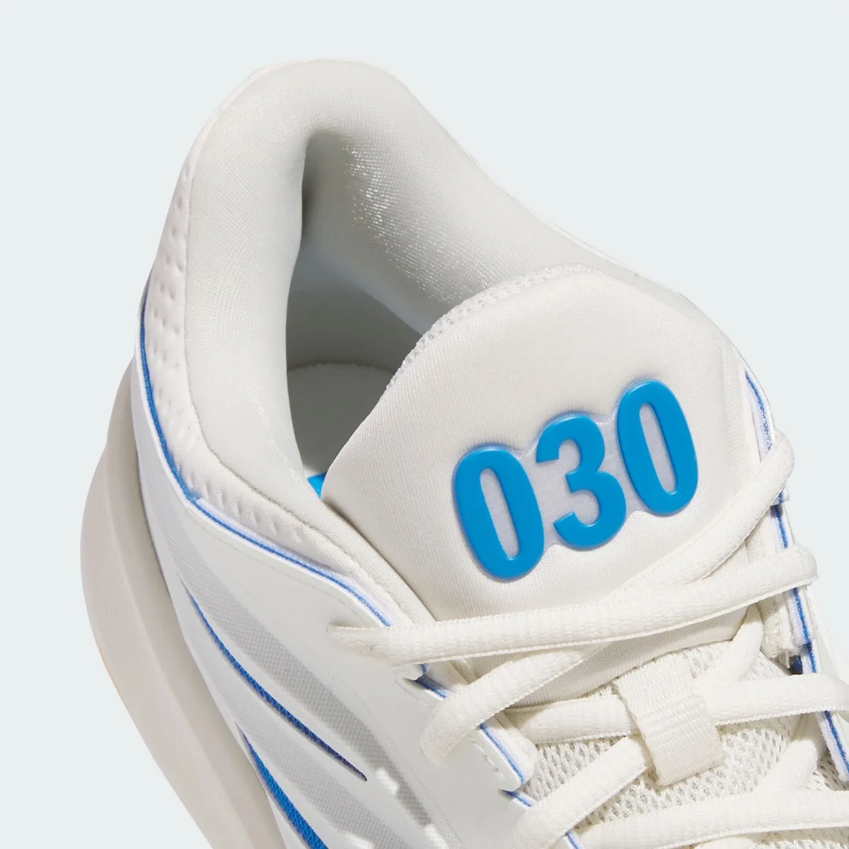 Detail of the collar and tongue with blue 030 numbers and white laces, Wagner Brothers