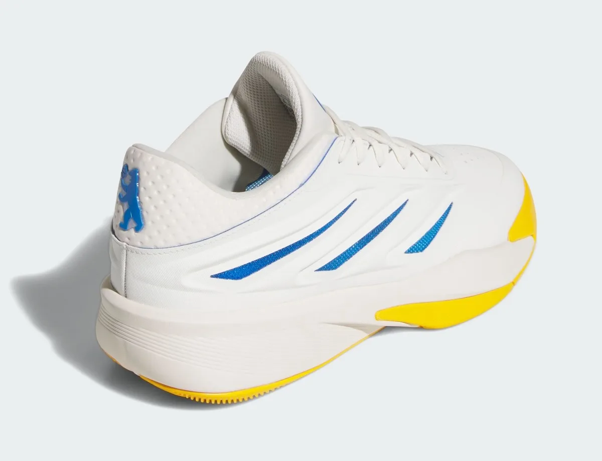 Rear three-quarter view with blue bear logo on the heel and yellow sole, Wagner Brothers