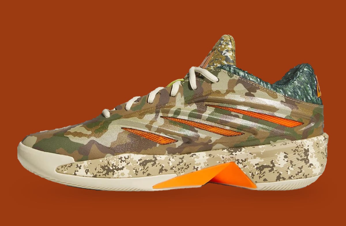 Medial view, camo upper with orange stripes and orange wedge on midsole, What The Camo