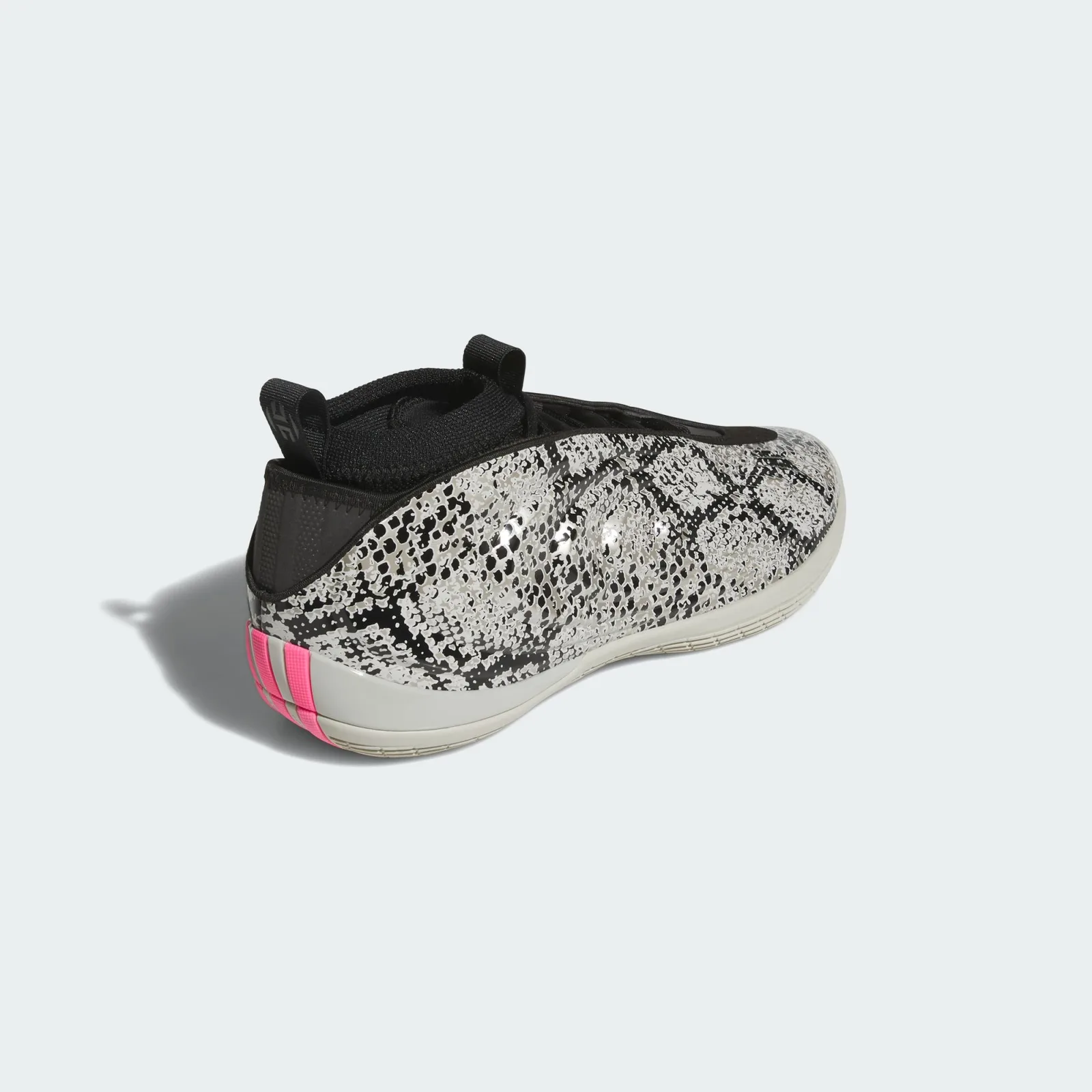Rear three-quarter view, snakeskin upper, pink and cream stripes on heel, black pull loops, Snakeskin